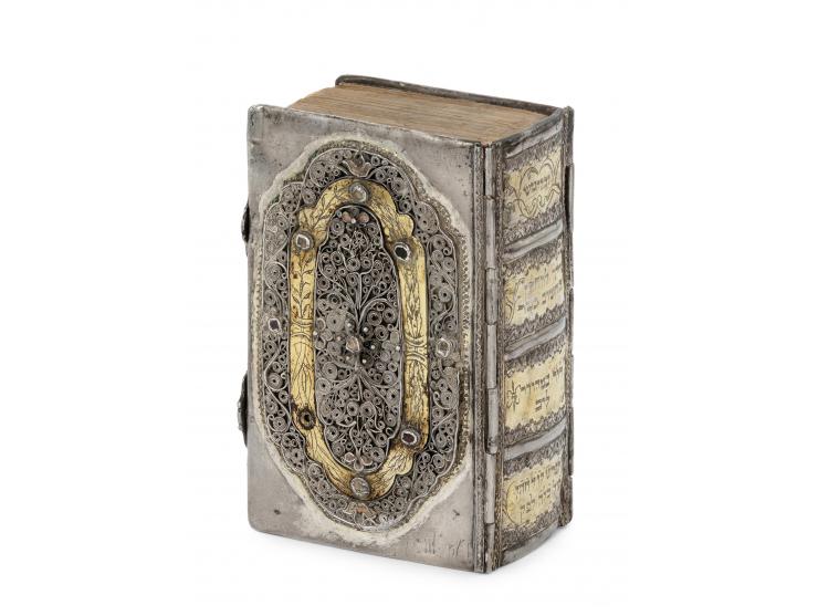
 Chumash in elaborate silver binding. [Probably Germany], dedicatory inscription to groom dated 1779.


 Silver, repouss&eac