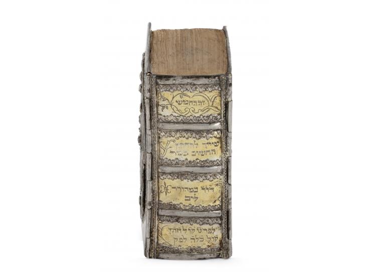 
 Chumash in elaborate silver binding. [Probably Germany], dedicatory inscription to groom dated 1779.


 Silver, repouss&eac