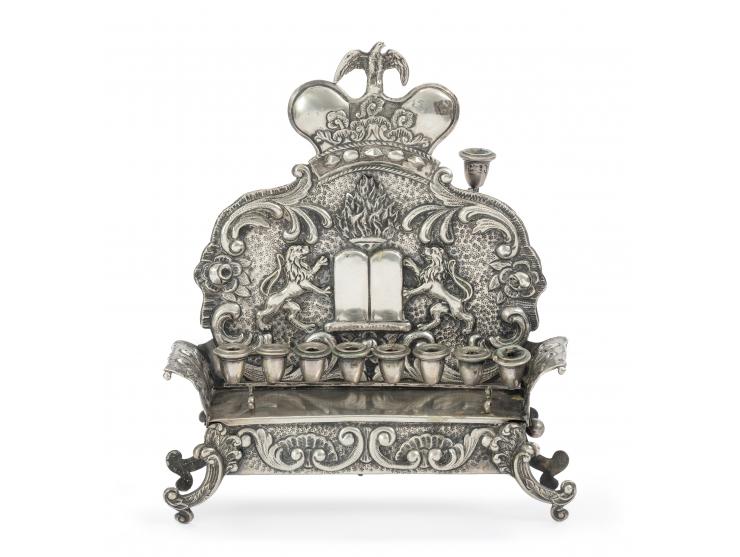 
 Hanukkah lamp with music box, probably made by Hermann S&uuml;dfeld. Vienna, 1884.


 Silver, repouss&eacute; and cast (mar