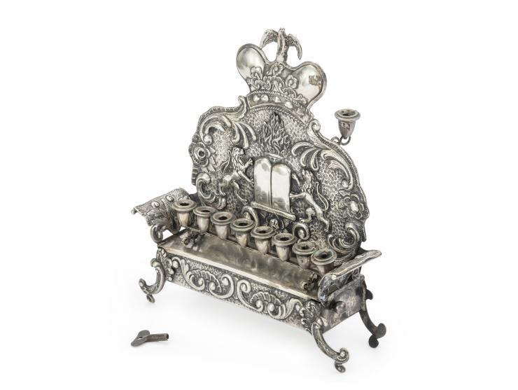 
 Hanukkah lamp with music box, probably made by Hermann S&uuml;dfeld. Vienna, 1884.


 Silver, repouss&eacute; and cast (mar