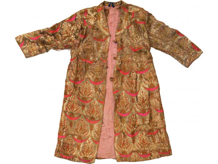 Three overcoats. [Bukhara, early 20th century].
 1. Ceremonial overcoat. Made of brocade silk in the shades of red, pink and 