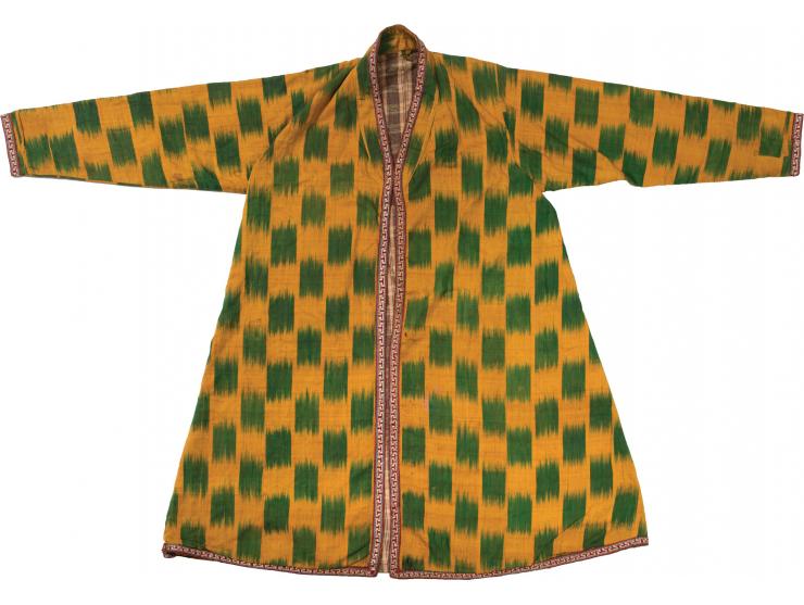 Three overcoats. [Bukhara, early 20th century].
 1. Ceremonial overcoat. Made of brocade silk in the shades of red, pink and 