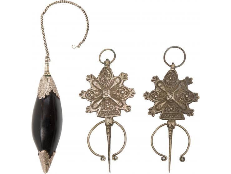 1-2. Two fibulae. Low grade silver. Morocco, [early 20th century].
 Length: 12.5 cm. Good condition.
 Literature: Jewish Life