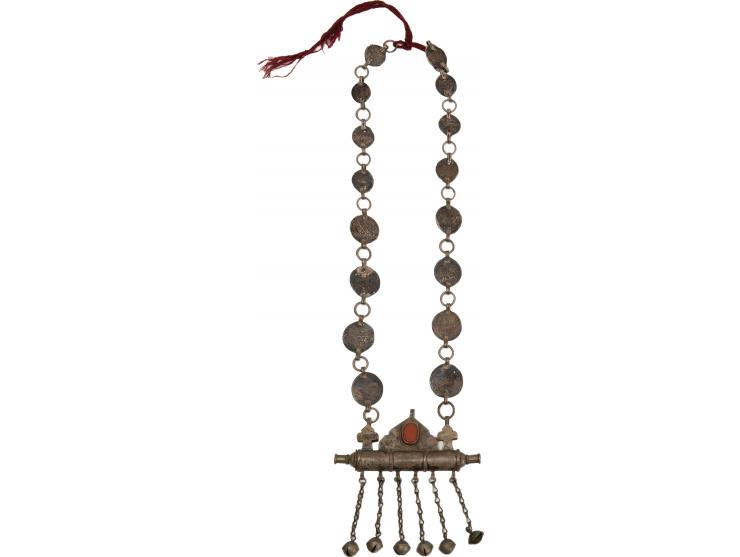 1. Necklace. [Morocco, early 20th century]. Necklace consisting of silver coins and at the end an amulet-case pendant (made o